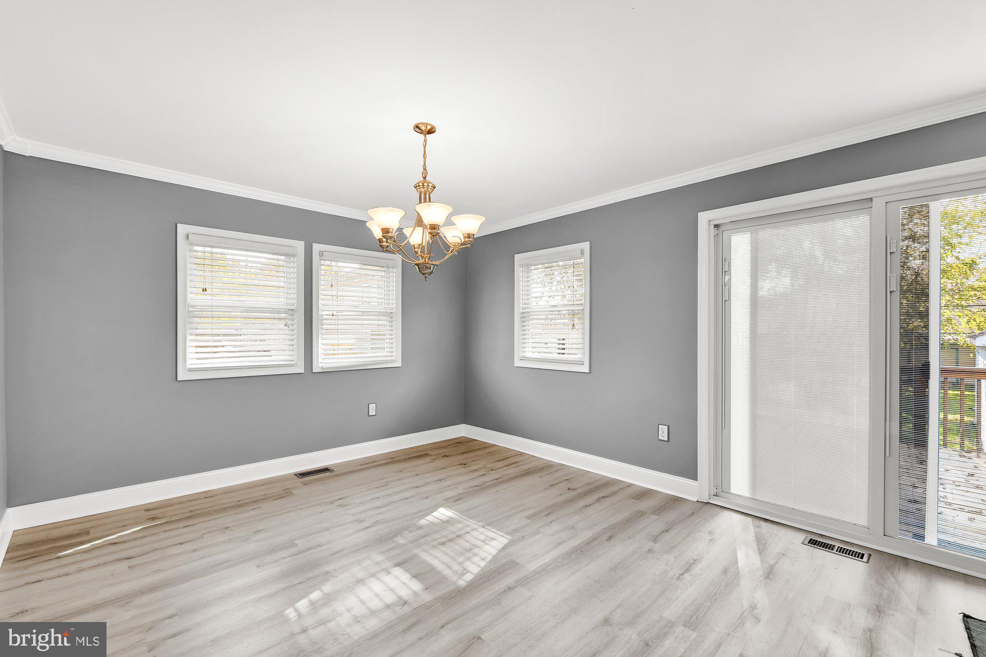 7339 Gunpowder Road Baltimore, MD 21220 - Photo 4 of 34 Bright Family room with views of the backyard