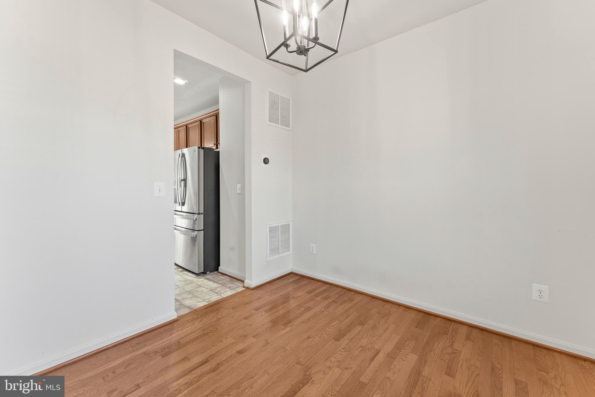 18350 Congressional Circle Ruther Glen, VA 22546 - Photo 14 of 55 a view of empty room with wooden floor