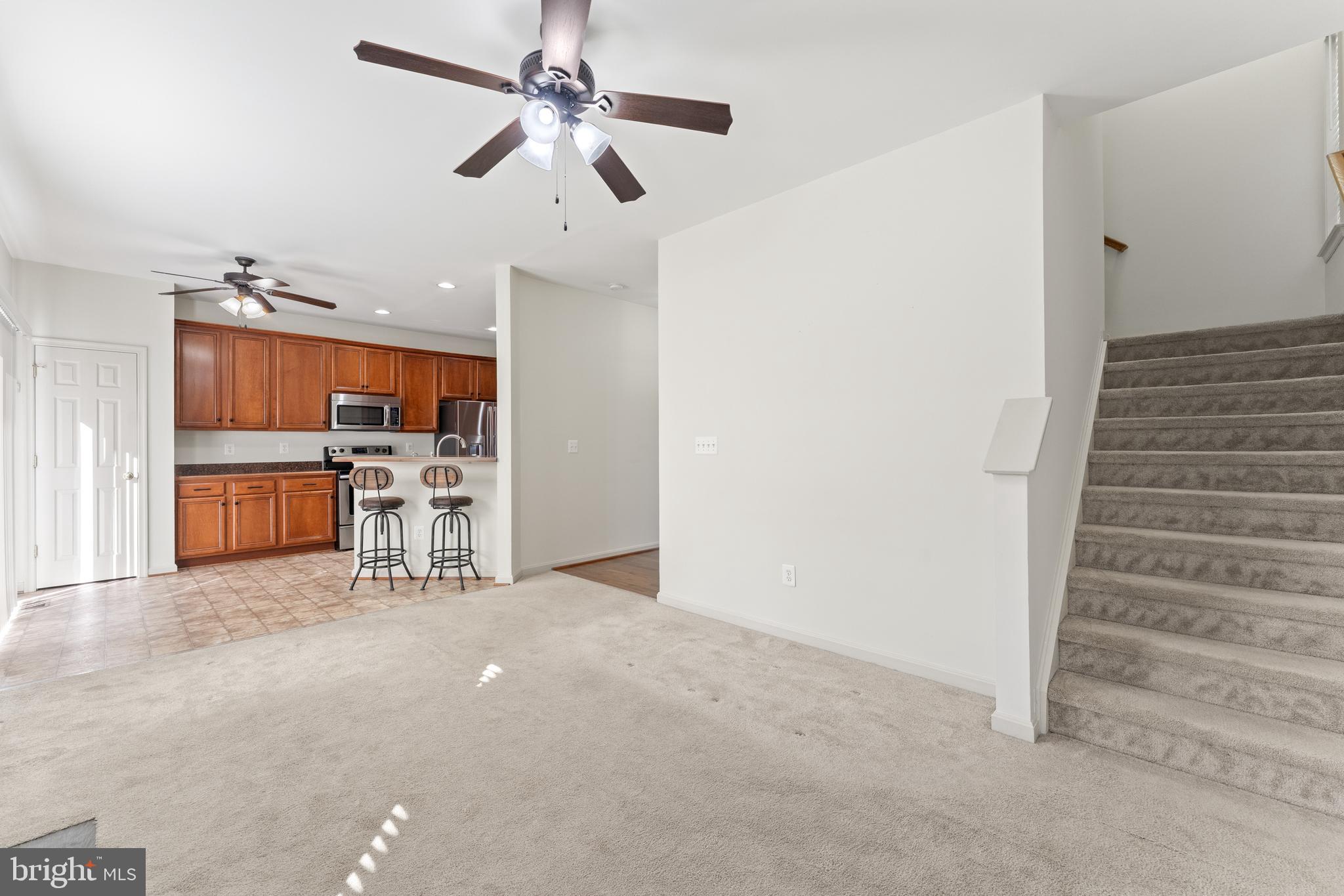 18350 Congressional Circle Ruther Glen, VA 22546 - Photo 18 of 55 family room open to the kitchen