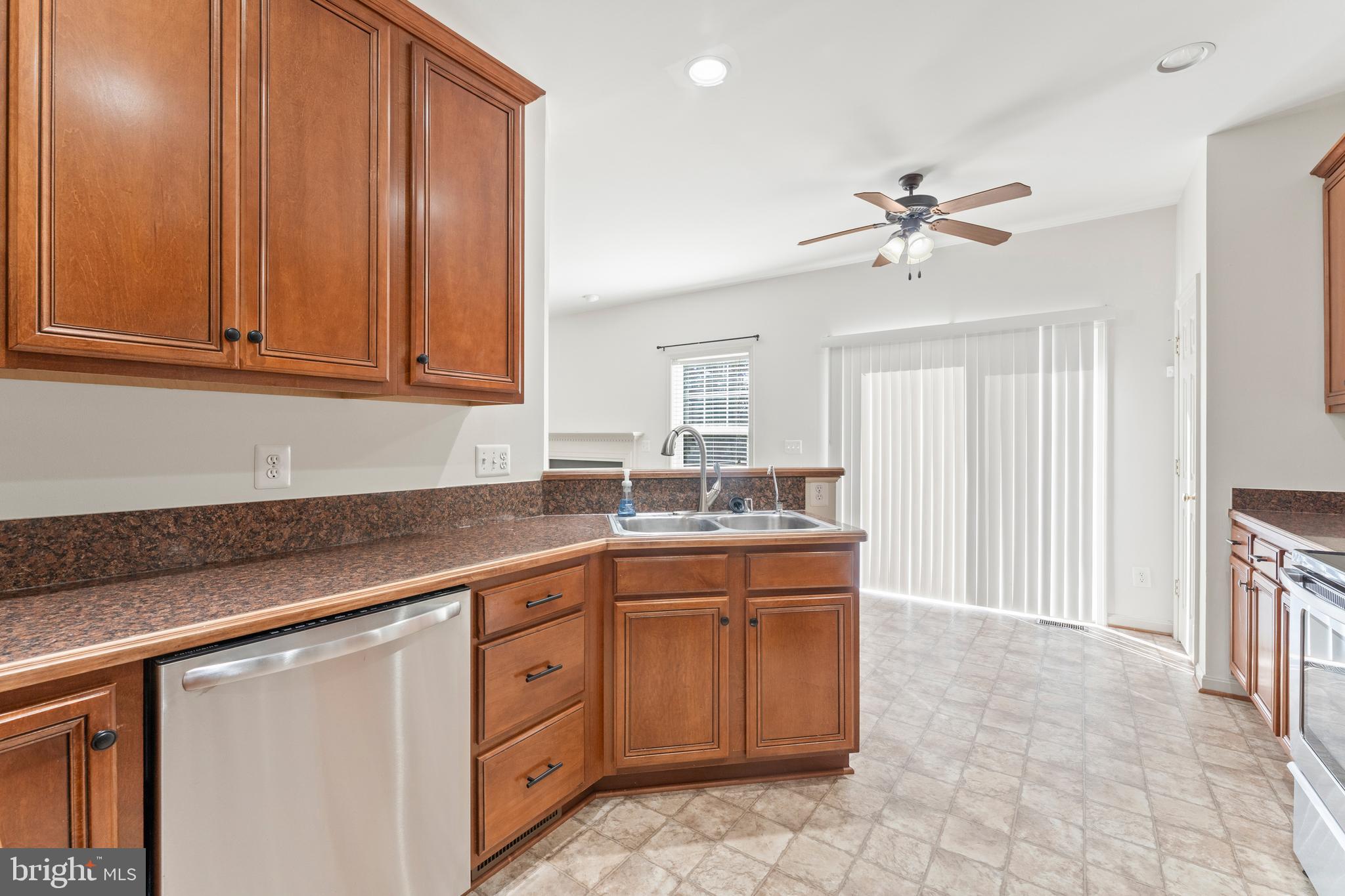 18350 Congressional Circle Ruther Glen, VA 22546 - Photo 26 of 55 a kitchen with a sink and cabinets