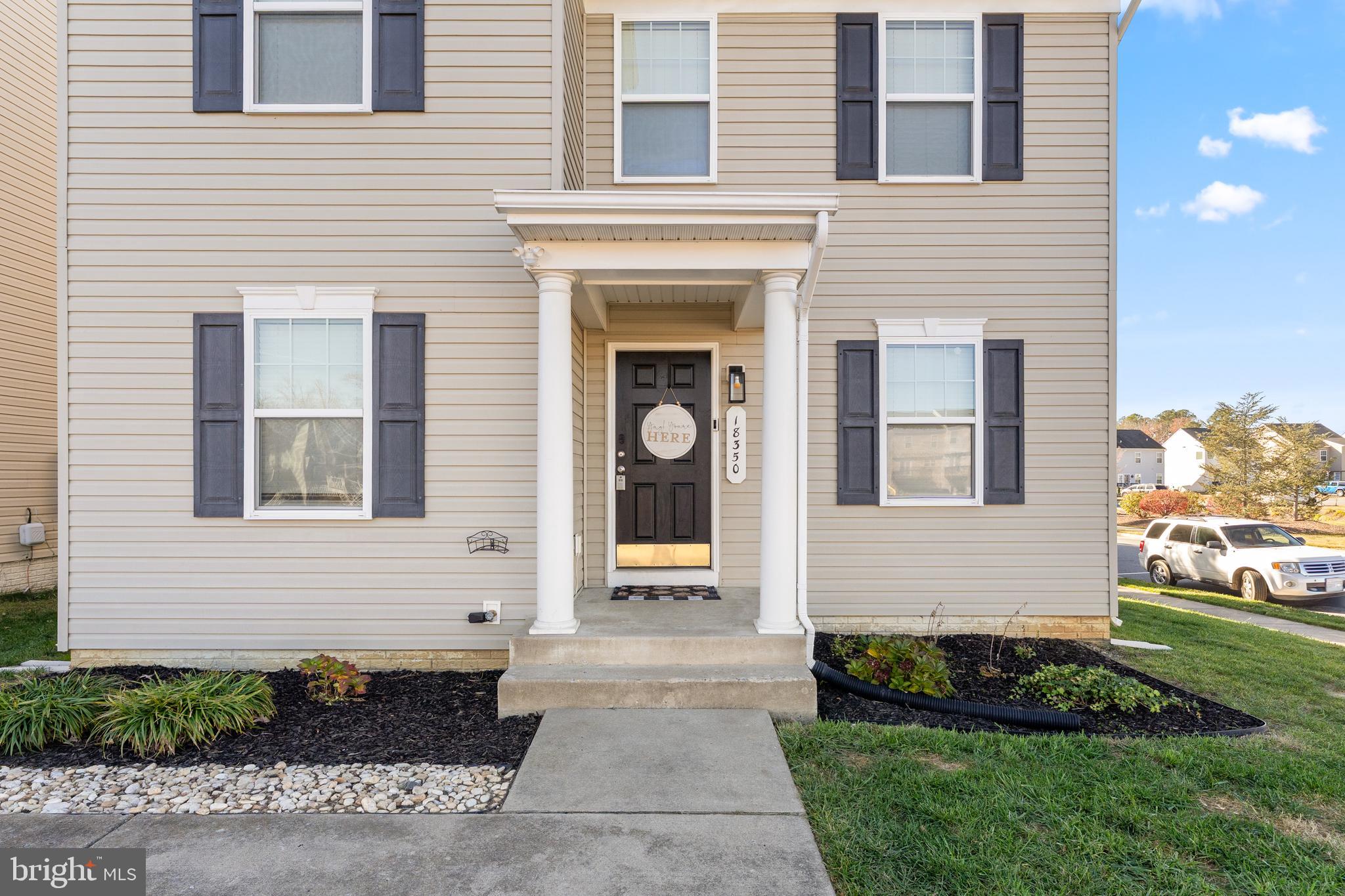 18350 Congressional Circle Ruther Glen, VA 22546 - Photo 48 of 55 a front view of a house with garden