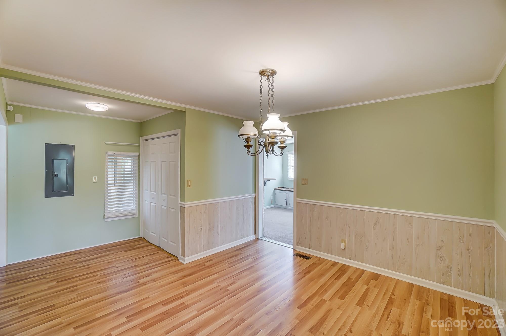 744 Ike Lynch Road Dallas, NC 28034 - Photo 17 of 47 a view of a livingroom with wooden floor