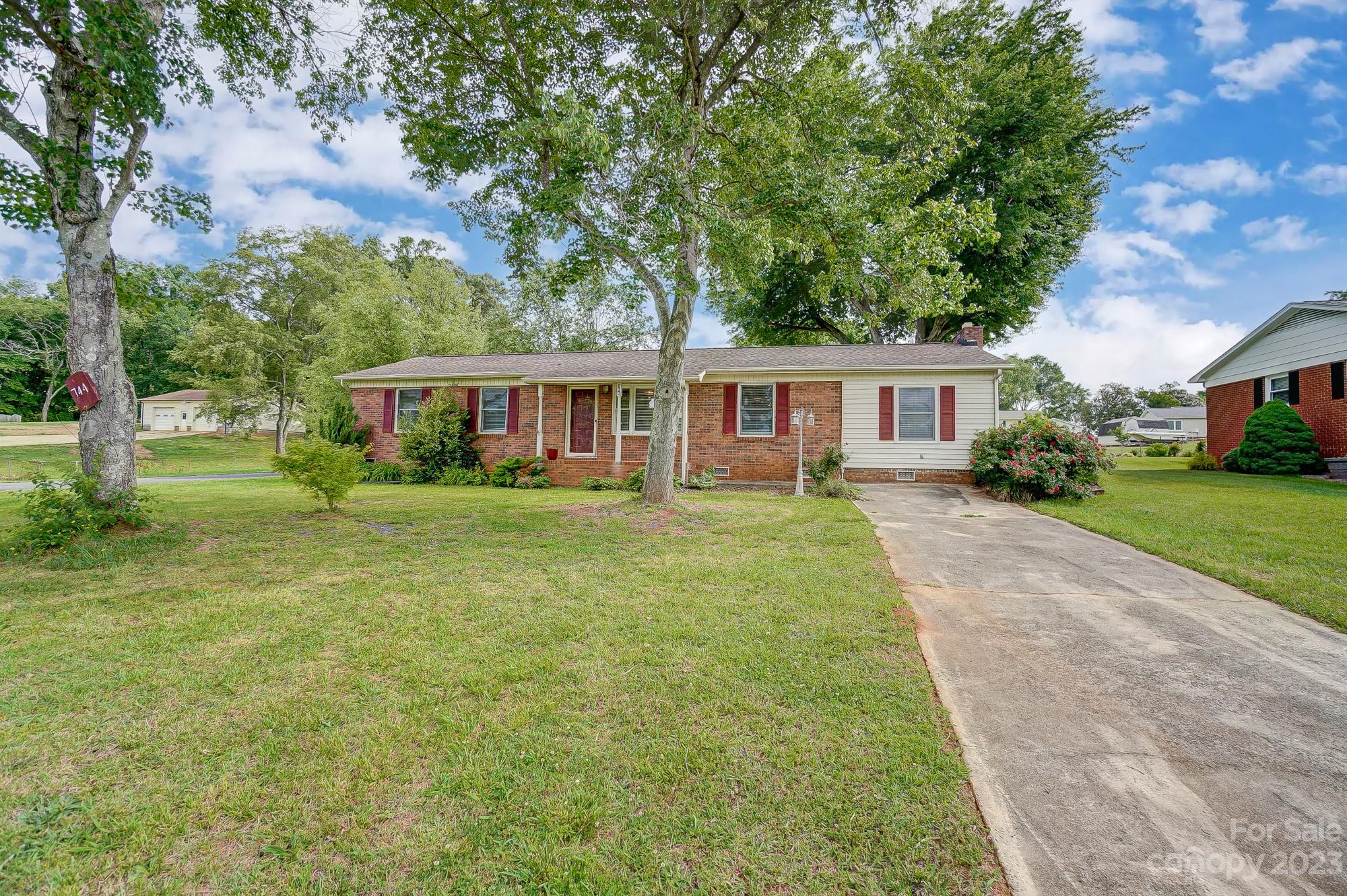 744 Ike Lynch Road Dallas, NC 28034 - Photo 2 of 47 a view of house with yard and green space