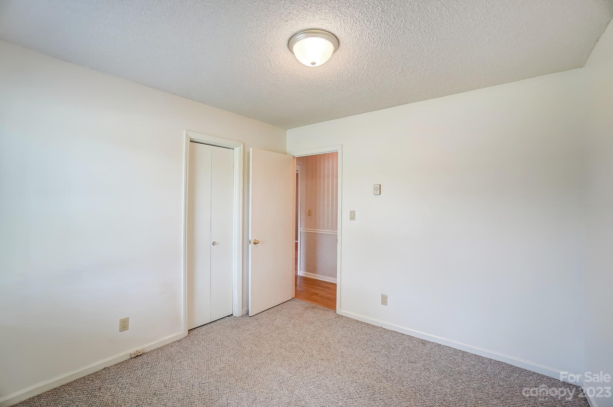 744 Ike Lynch Road Dallas, NC 28034 - Photo 32 of 47 a view of an empty room