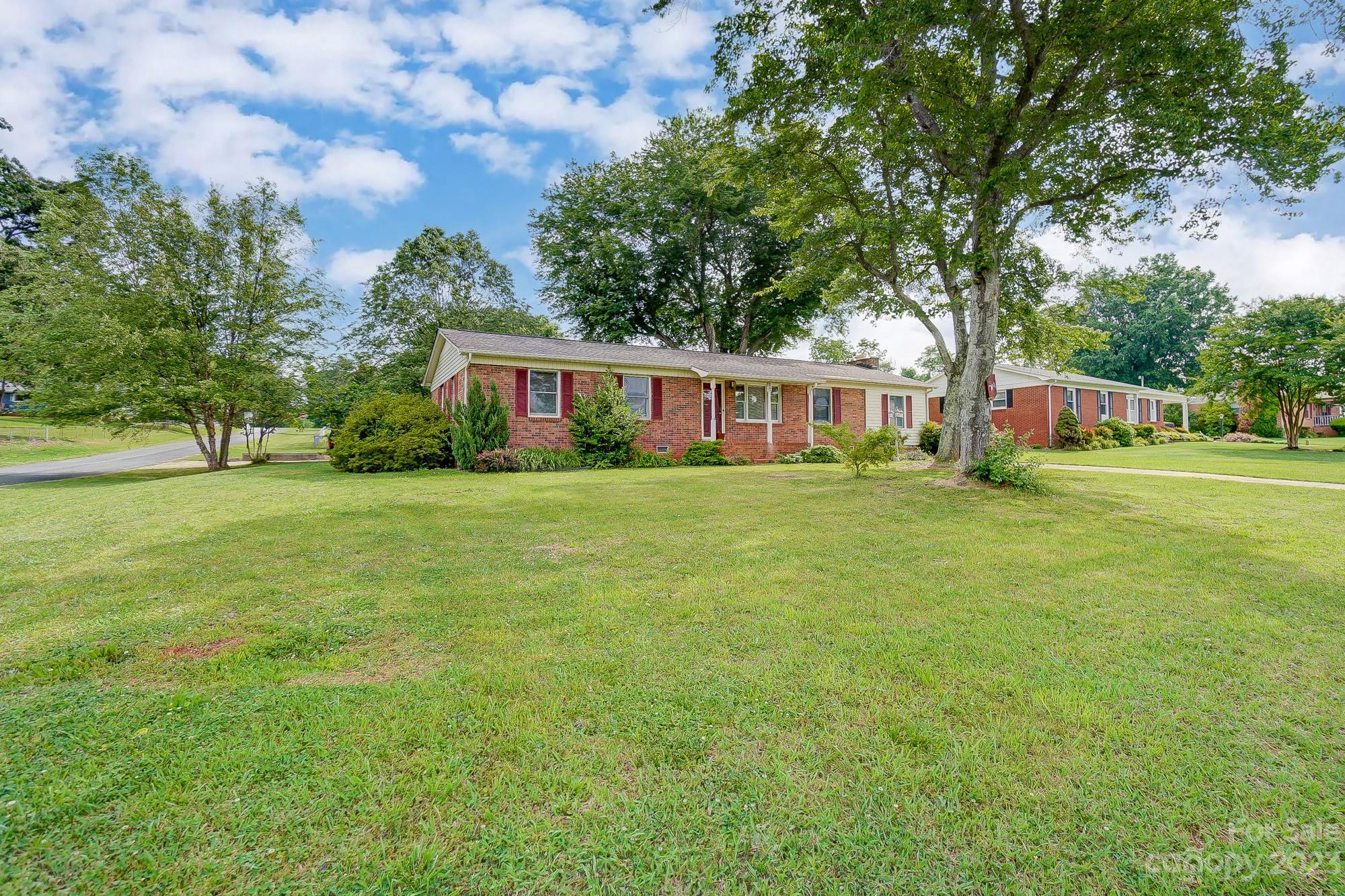 744 Ike Lynch Road Dallas, NC 28034 - Photo 4 of 47 a view of a house with a big yard