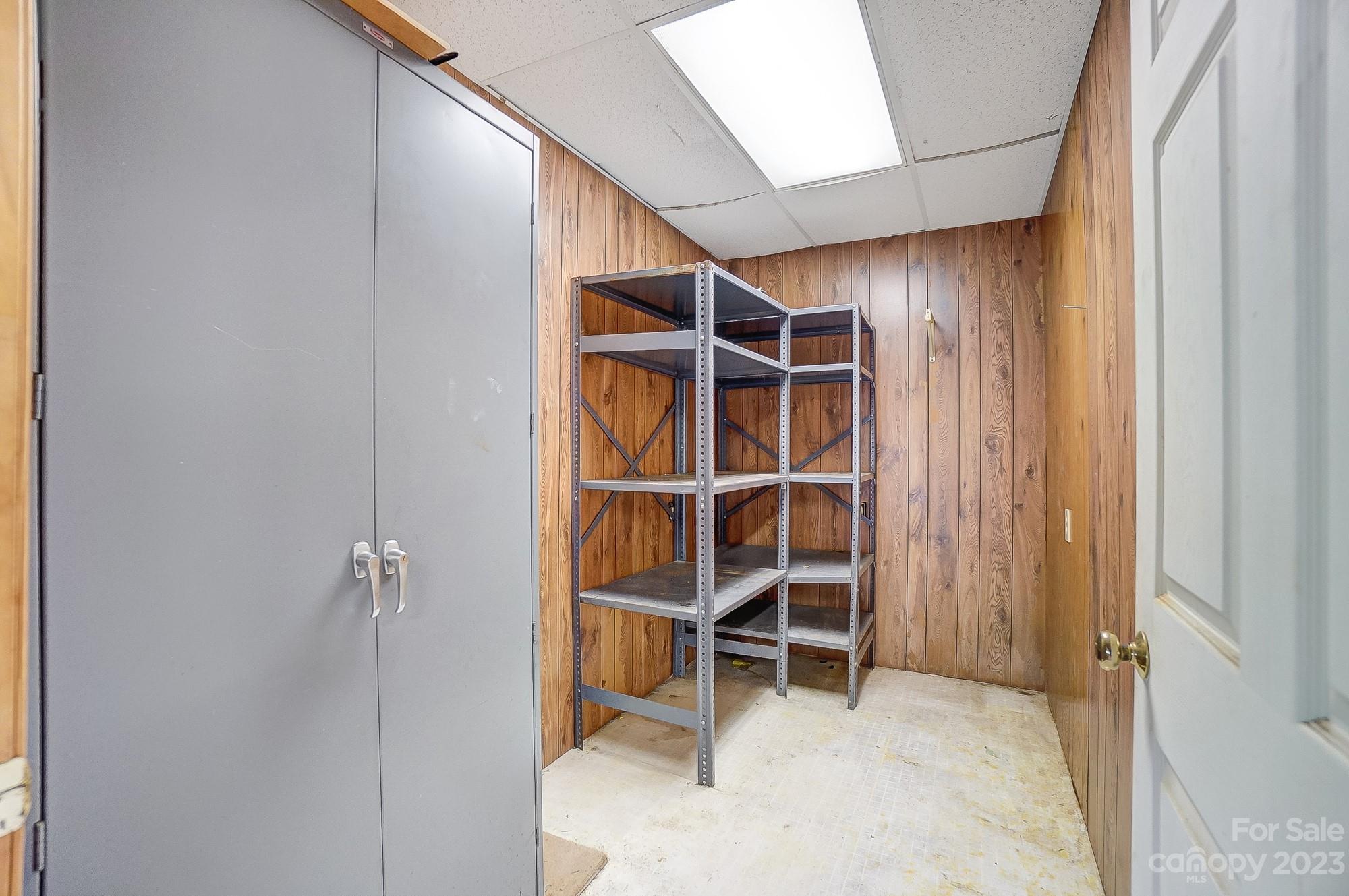 744 Ike Lynch Road Dallas, NC 28034 - Photo 44 of 47 a view of an empty room with empty shelves