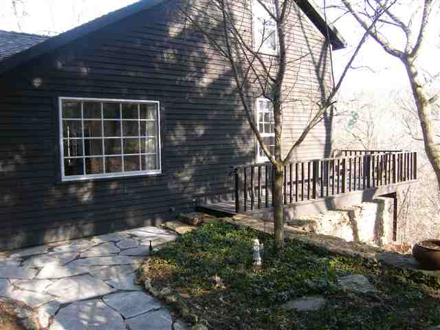 2701 West Forest Road Freeport, IL 61032 - Photo 1 of 9 a front view of a house with garden