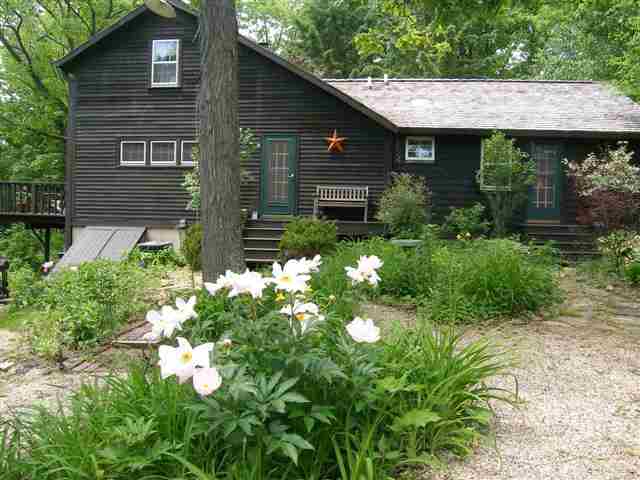 2701 West Forest Road Freeport, IL 61032 - Photo 2 of 9 a front view of a house with a yard