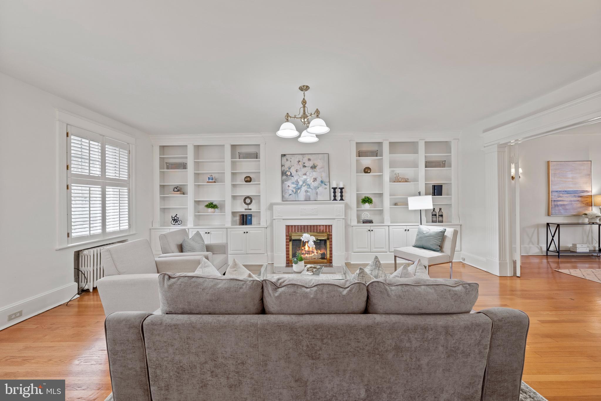 2709 Woodley Road Northwest Washington, DC 20008 - Photo 4 of 34 Living room with wood burning fireplace