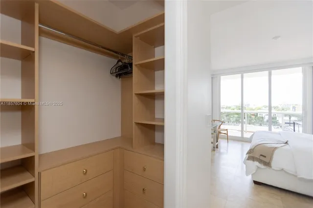 a living room with furniture and a gate