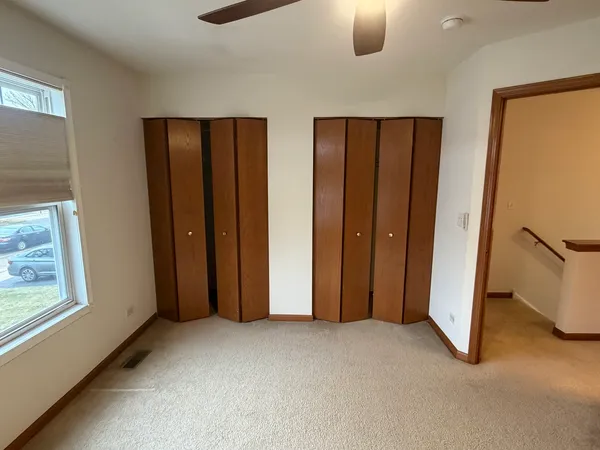 a view of empty room with windows