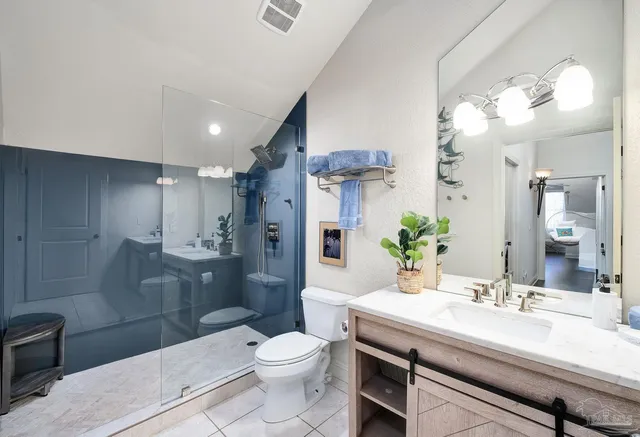 a front view of a house with a swimming pool