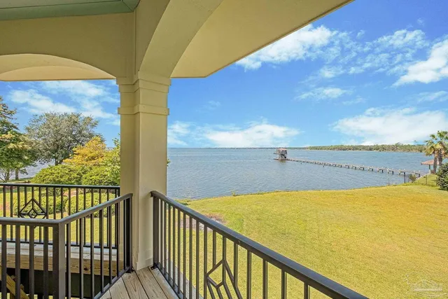 a picture of a bathroom with a shower and a mirror