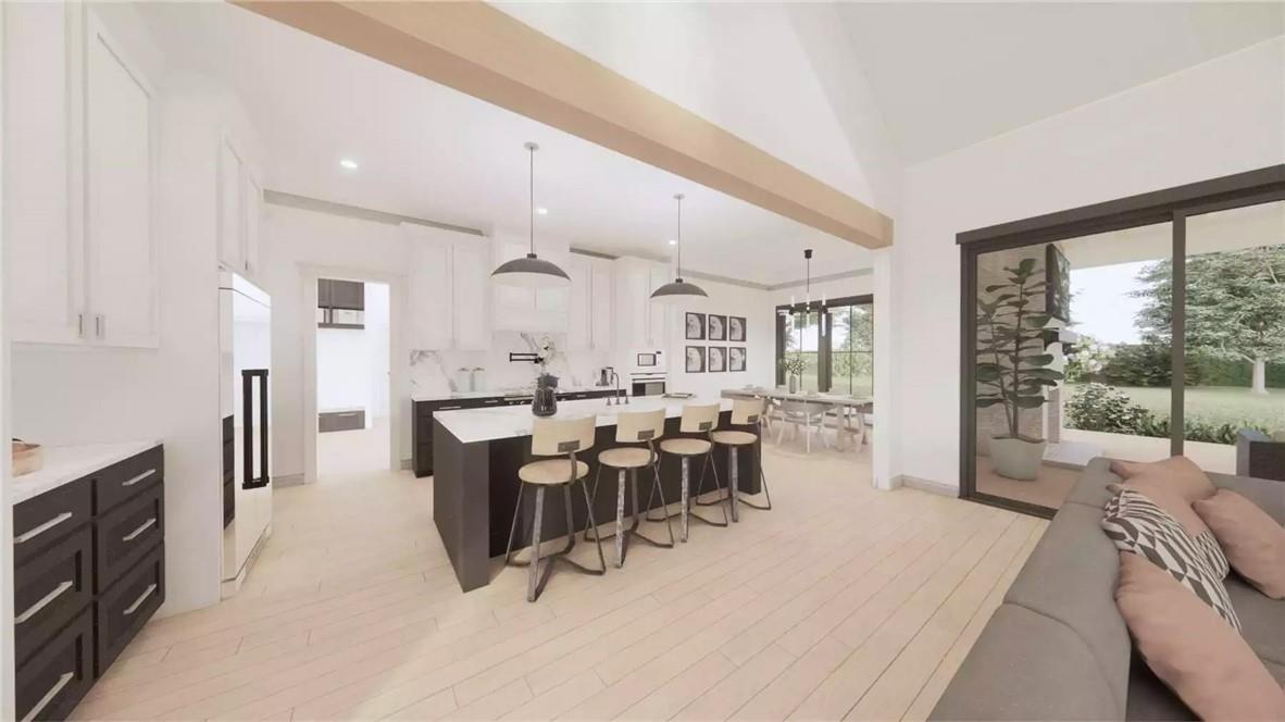 204 Rogers Road Pendleton, SC 29670 - Photo 7 of 12 This bright and airy kitchen flows seamlessly into the dining area, featuring a spacious island.