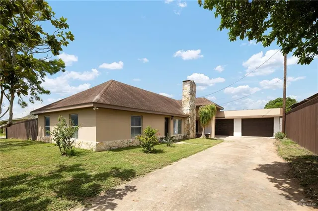 a front view of house with yard
