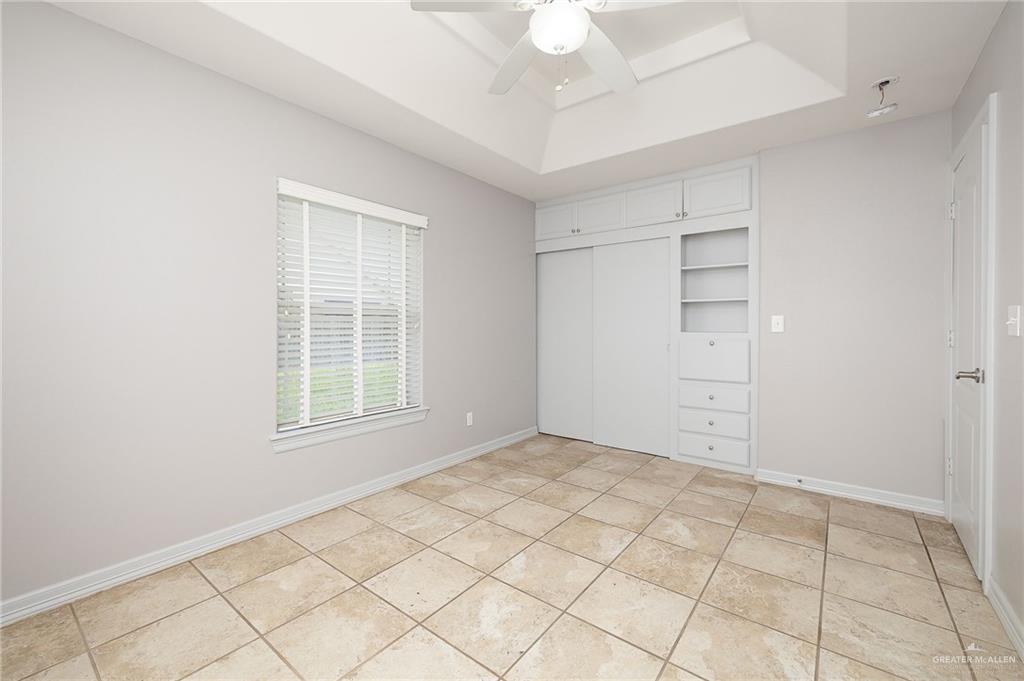 424 Frost Proof Drive Weslaco, TX 78599 - Photo 16 of 21 an empty room with windows