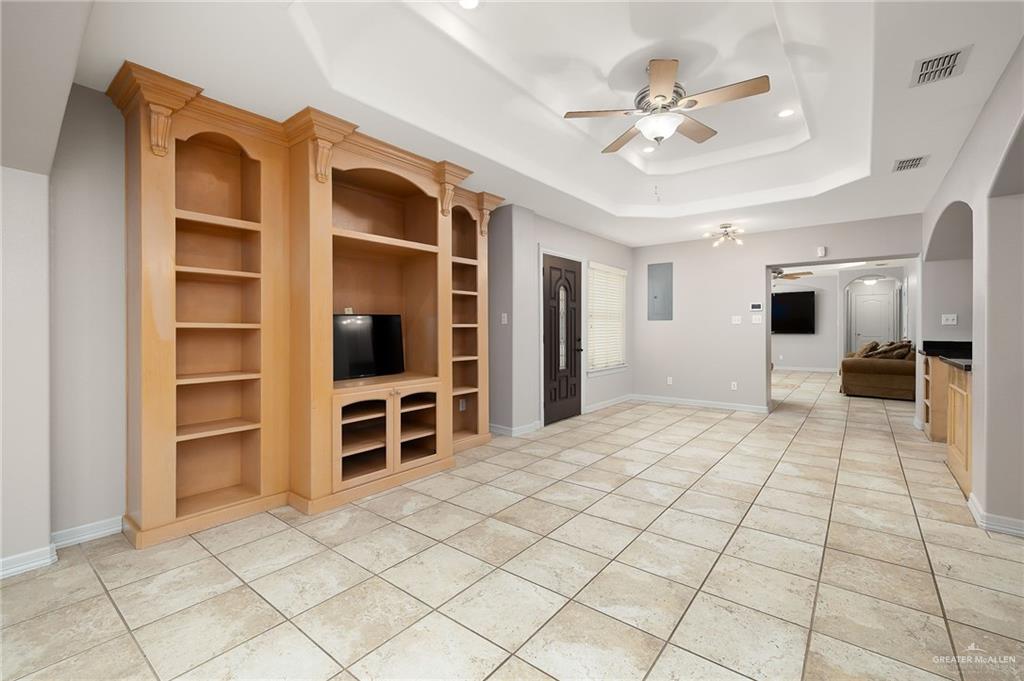 424 Frost Proof Drive Weslaco, TX 78599 - Photo 6 of 21 a view of an empty room with a window