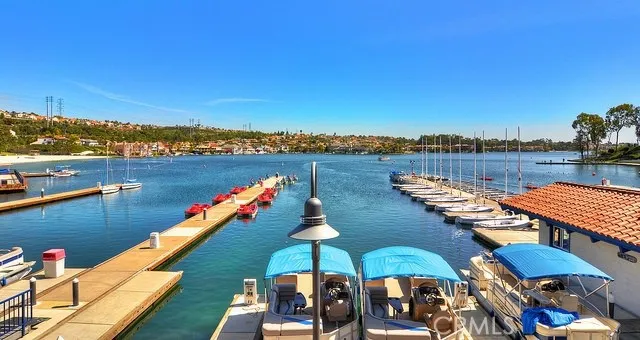a view of a house with potted plants