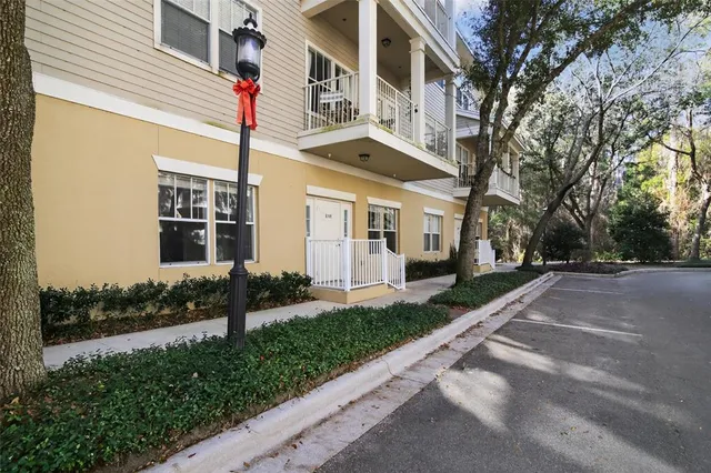 a view of a street with a building in the background