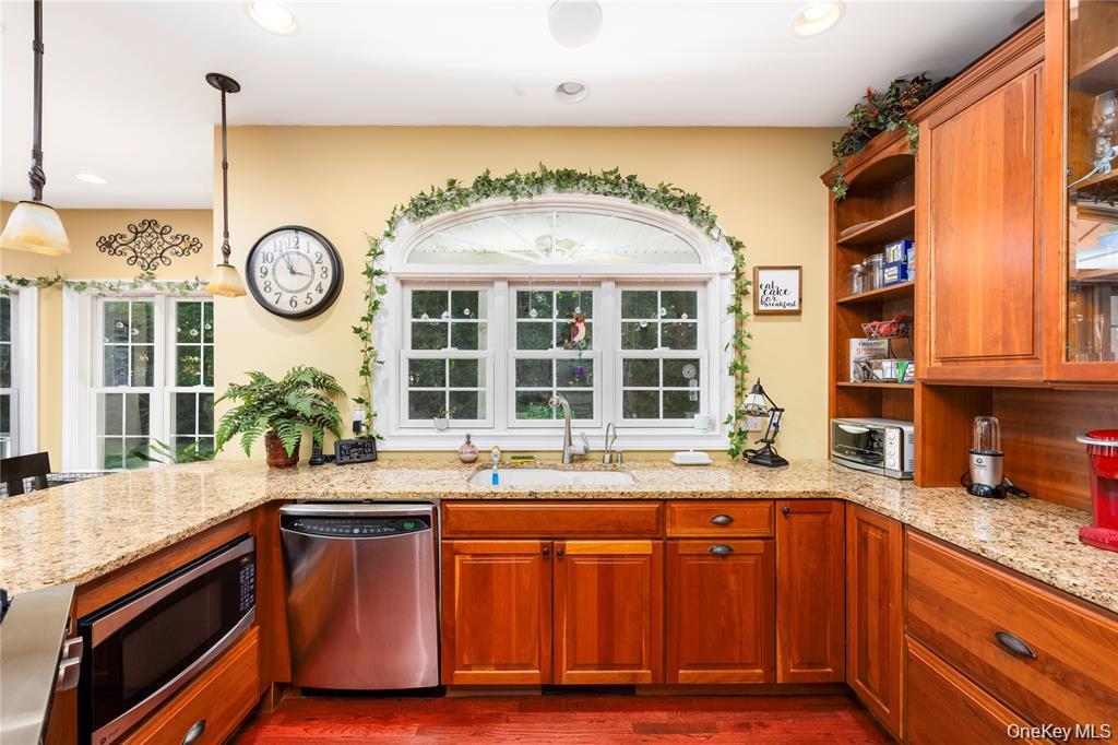 6 Old Town Road Beacon, NY 12508 - Photo 14 of 49 a kitchen with a large window and cabinets