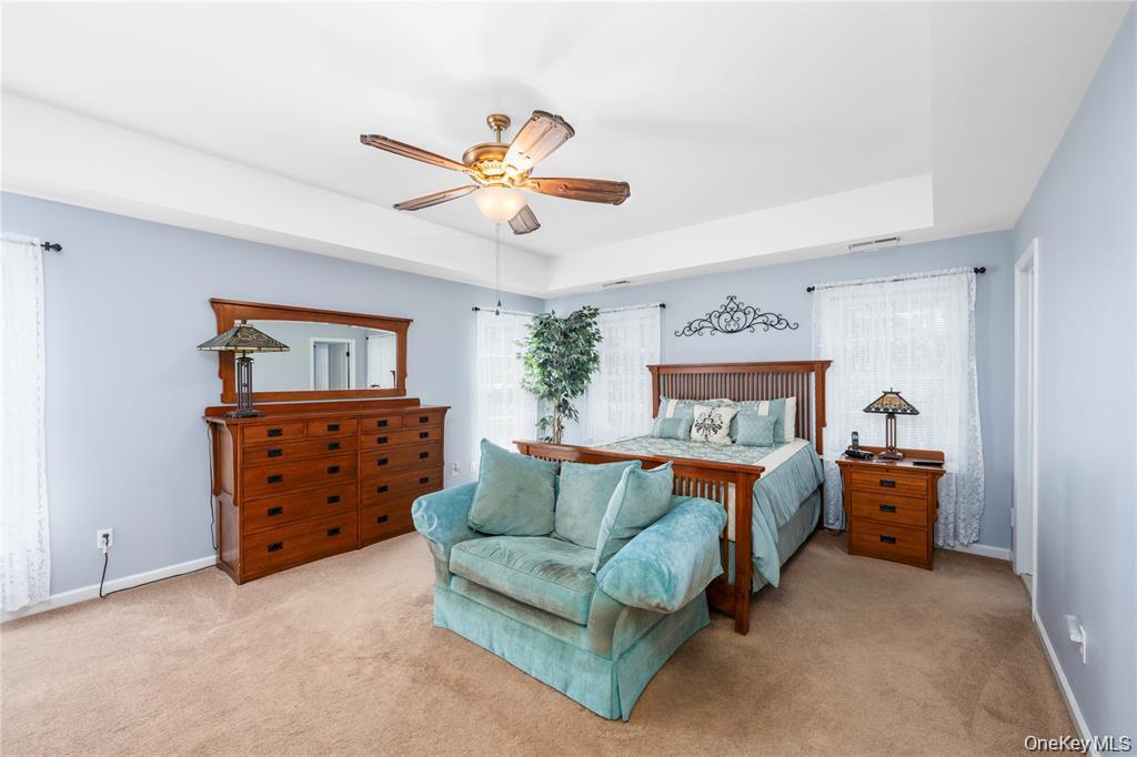 6 Old Town Road Beacon, NY 12508 - Photo 24 of 49 a bed room with a bed and a chandelier