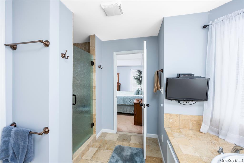 6 Old Town Road Beacon, NY 12508 - Photo 27 of 49 a living room with furniture and a flat screen tv