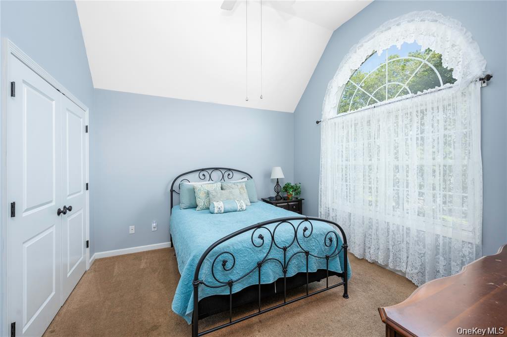 6 Old Town Road Beacon, NY 12508 - Photo 28 of 49 a bedroom with a bed a window and dresser