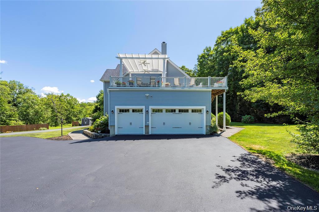 6 Old Town Road Beacon, NY 12508 - Photo 33 of 49 a view of a house with a yard and large trees
