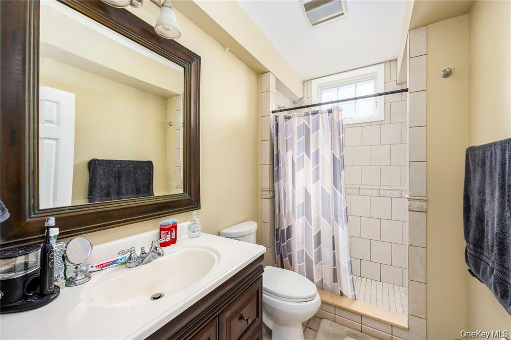 6 Old Town Road Beacon, NY 12508 - Photo 40 of 49 a bathroom with a sink toilet and shower