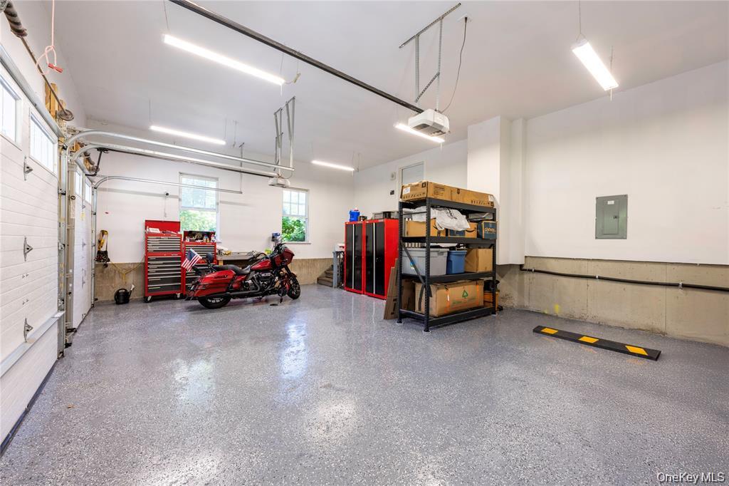 6 Old Town Road Beacon, NY 12508 - Photo 42 of 49 a view of a garage with a large window and a chandelier