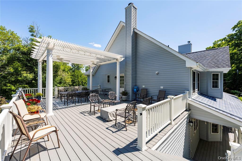 6 Old Town Road Beacon, NY 12508 - Photo 49 of 49 a view of a patio with a table chairs and backyard