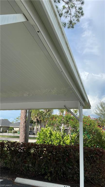 267 Quail Forest Boulevard, Unit 111 Naples, FL 34105 - Photo 39 of 41 a view of a garden