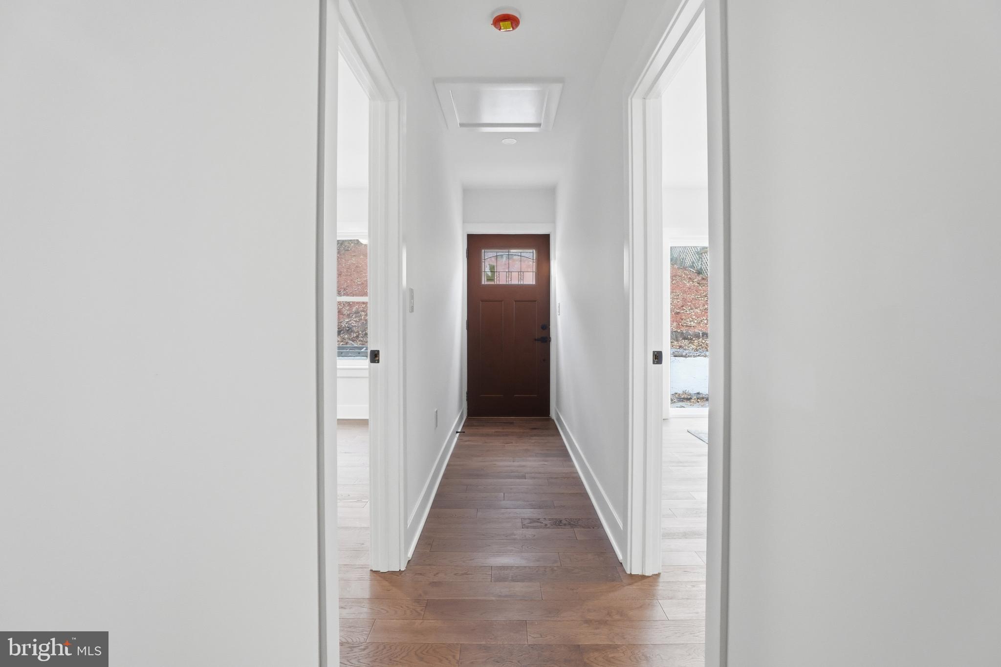 413 Williamsburg Drive Silver Spring, MD 20901 - Photo 14 of 33 a view of a hallway with wooden floor