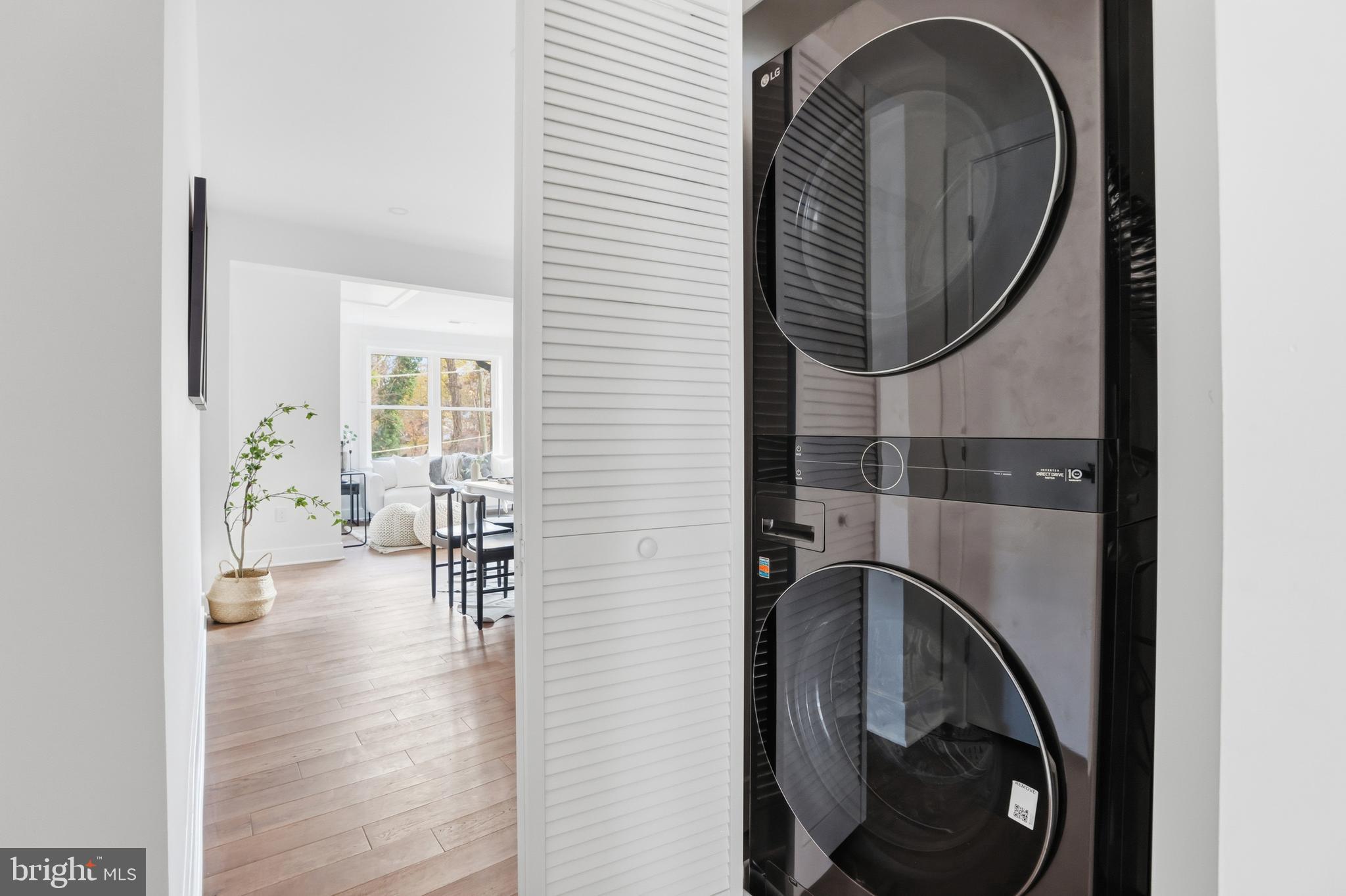 413 Williamsburg Drive Silver Spring, MD 20901 - Photo 27 of 33 a view of a hallway with washer and dryer