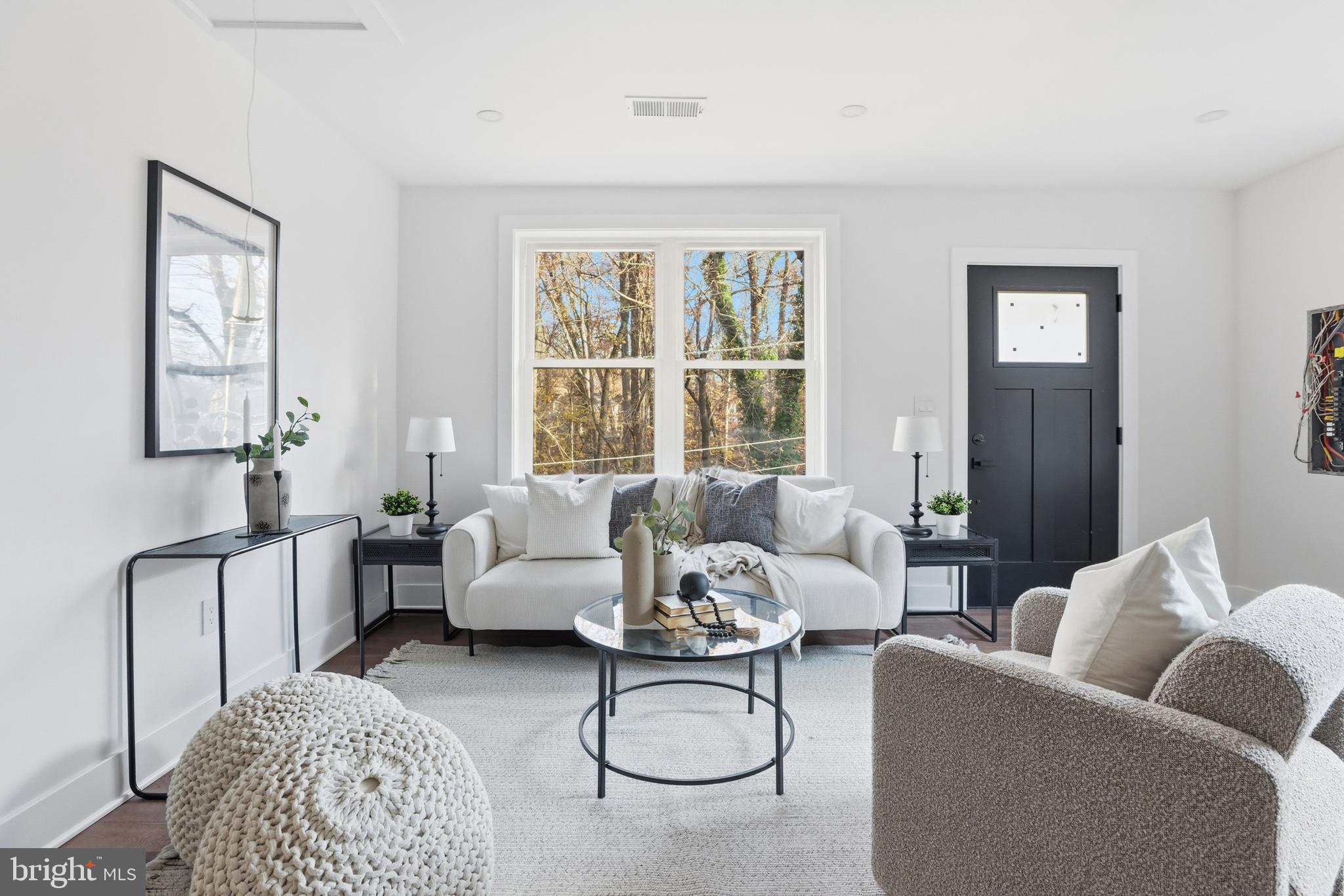 413 Williamsburg Drive Silver Spring, MD 20901 - Photo 6 of 33 a living room with furniture ceiling fan and a window