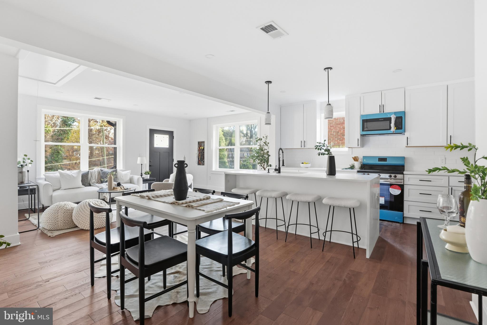 413 Williamsburg Drive Silver Spring, MD 20901 - Photo 8 of 33 a dining room with furniture and wooden floor