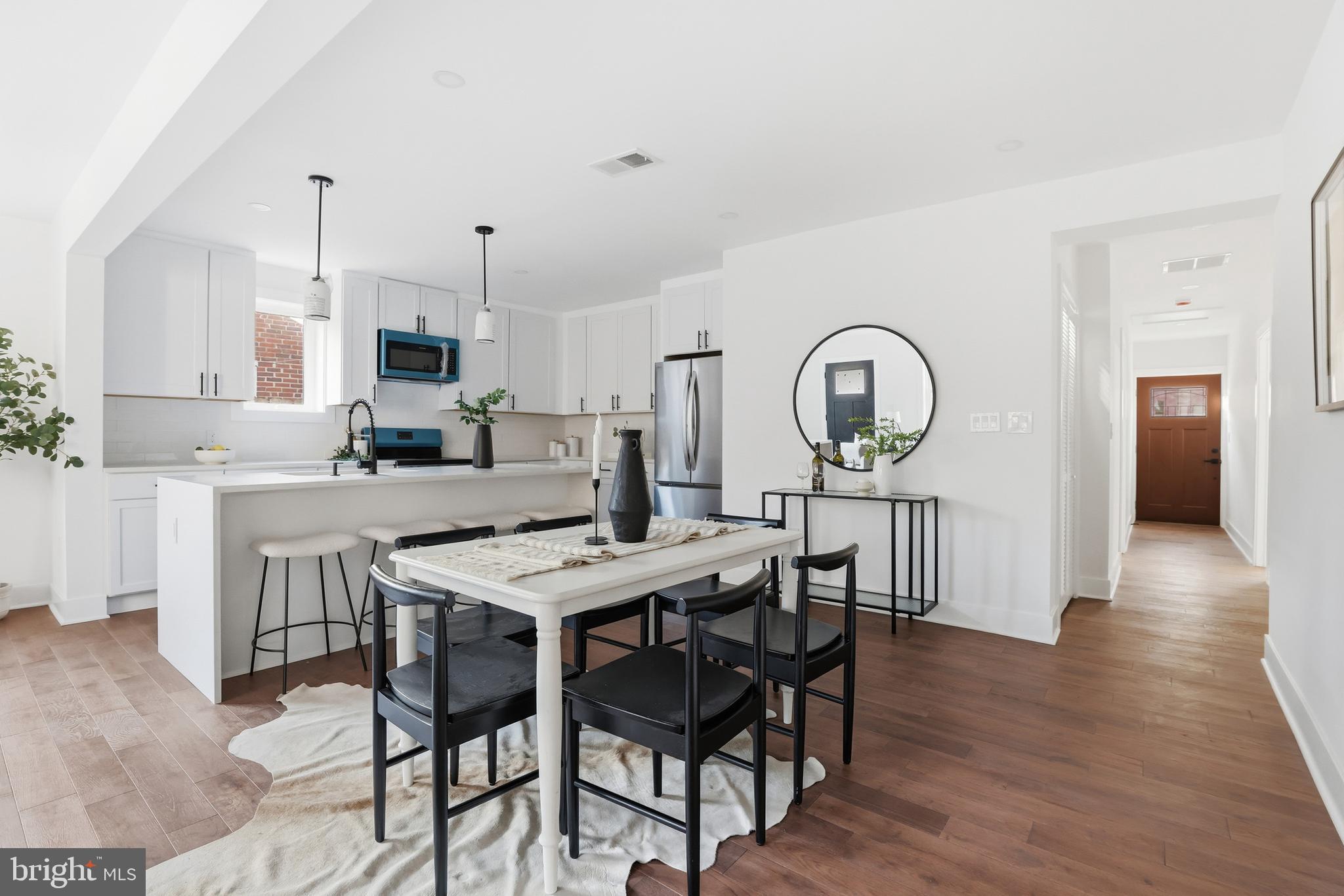 413 Williamsburg Drive Silver Spring, MD 20901 - Photo 9 of 33 a view of a dining room with furniture and window