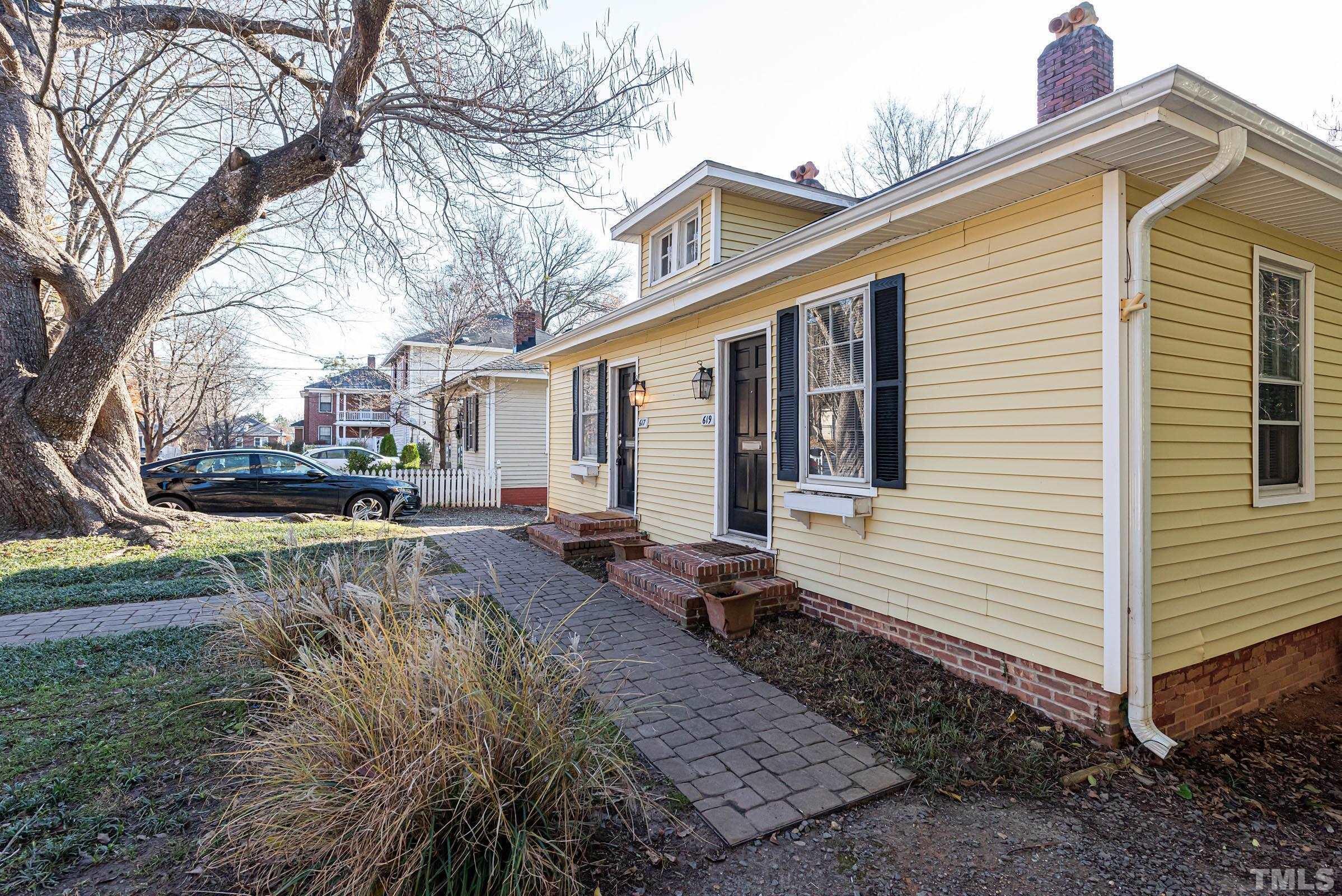 619 Hinsdale Street Raleigh, NC 27605 - Photo 17 of 34 a view of a house with a yard