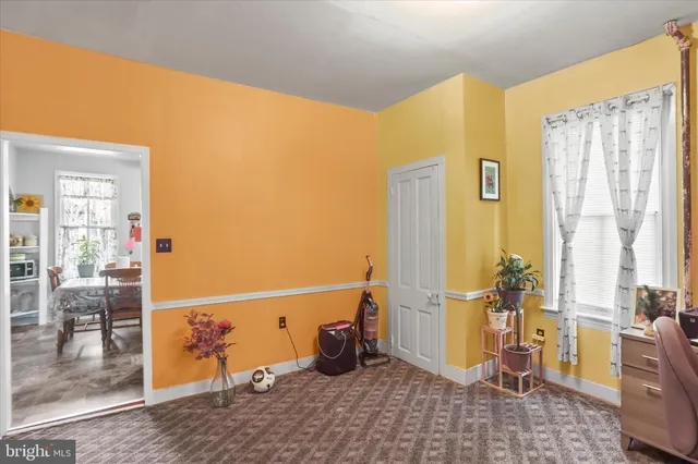 a view of a living room and bathroom