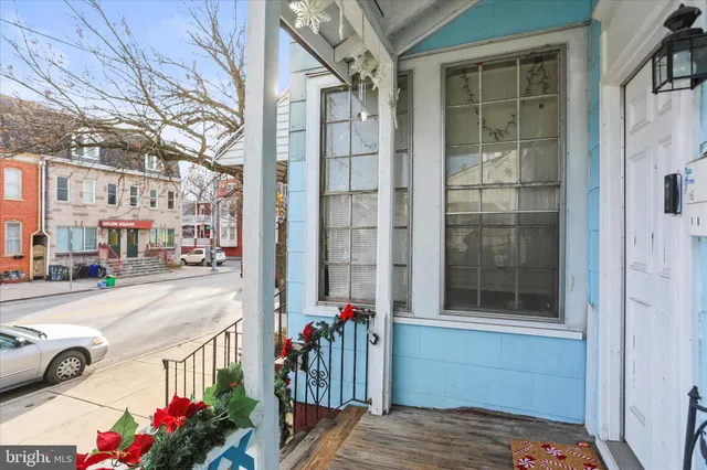 a view of a street with cars