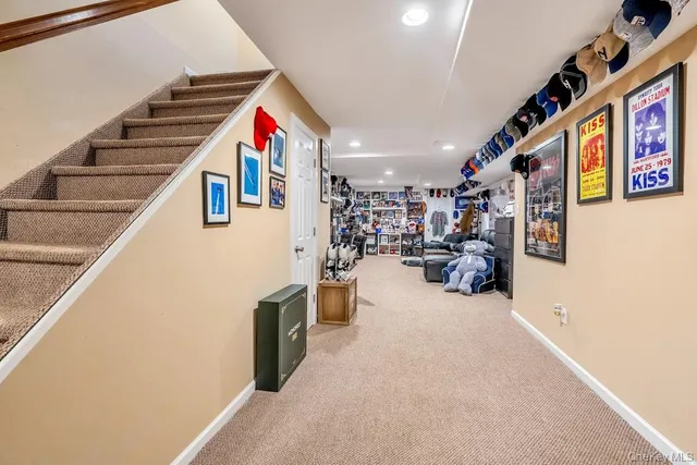 a very nice looking room with many windows and furniture