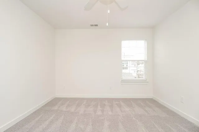a bathroom with a shower sink and vanity