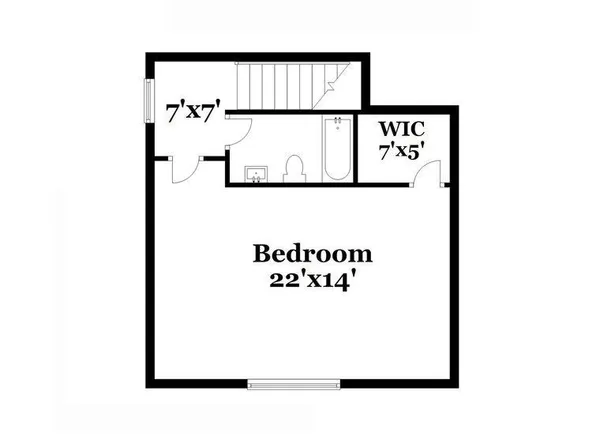 an empty room with wooden floor and window