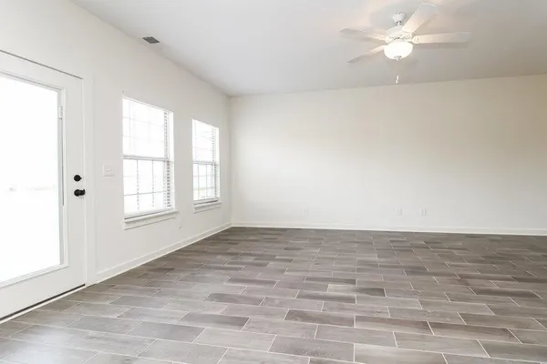 a view of a kitchen with a sink and dishwasher wooden floor