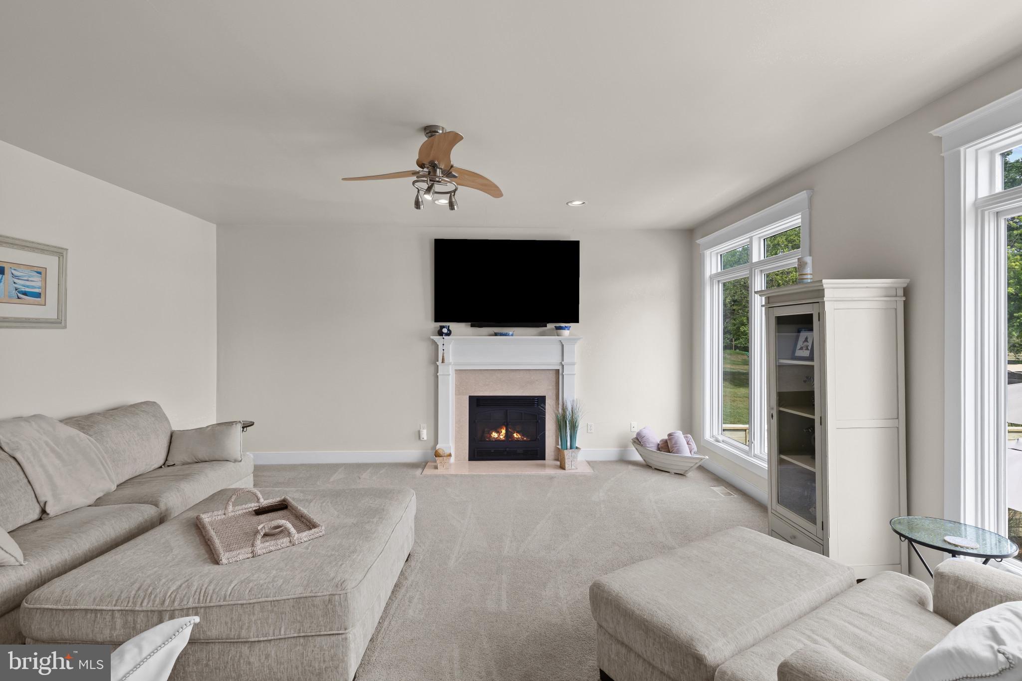 3733 Thomas Point Road Annapolis, MD 21403 - Photo 9 of 46 Family room with fireplace