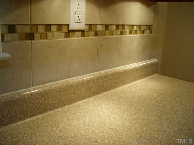 7309 Shawan Road Wendell, NC 27591 - Photo 7 of 12 Custom tile backsplash and new counter tops.