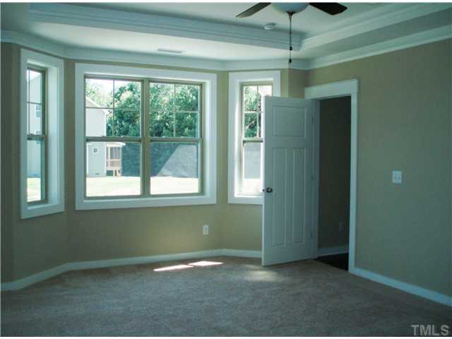 6100 Spring Branch Circle, Unit 42 Raleigh, NC 27603 - Photo 6 of 13 Master Bedroom Suite is conveniently located downstairs