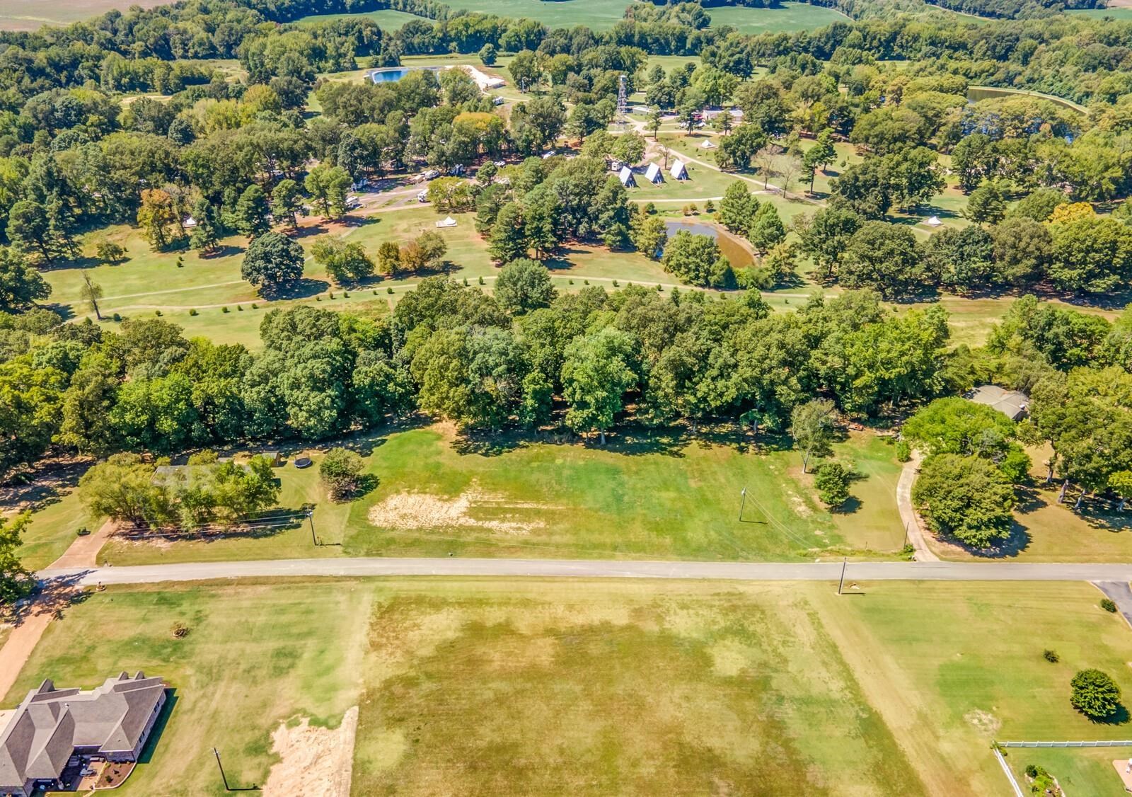 46 Blackgum Road Brownsville, TN 38012 - Photo 14 of 18 a view of a garden with an outdoor space