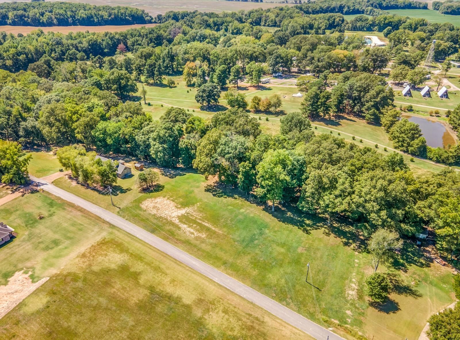 46 Blackgum Road Brownsville, TN 38012 - Photo 18 of 18 a view of swimming pool from a lake view