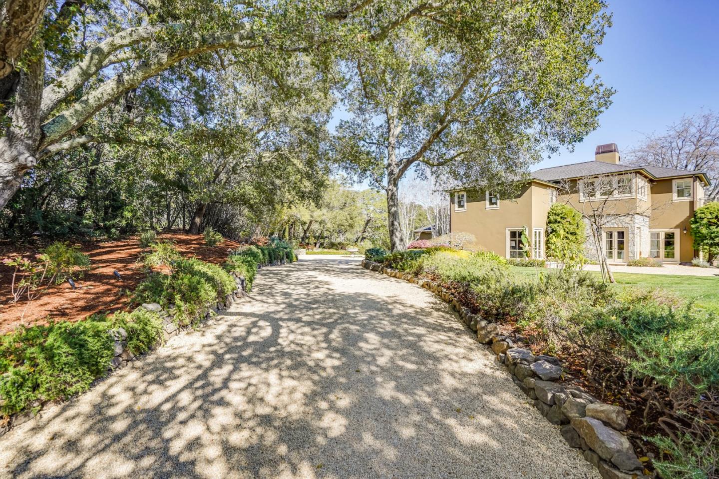 540 Moore Road Woodside, CA 94062 - Photo 11 of 85 a front view of a house with a yard